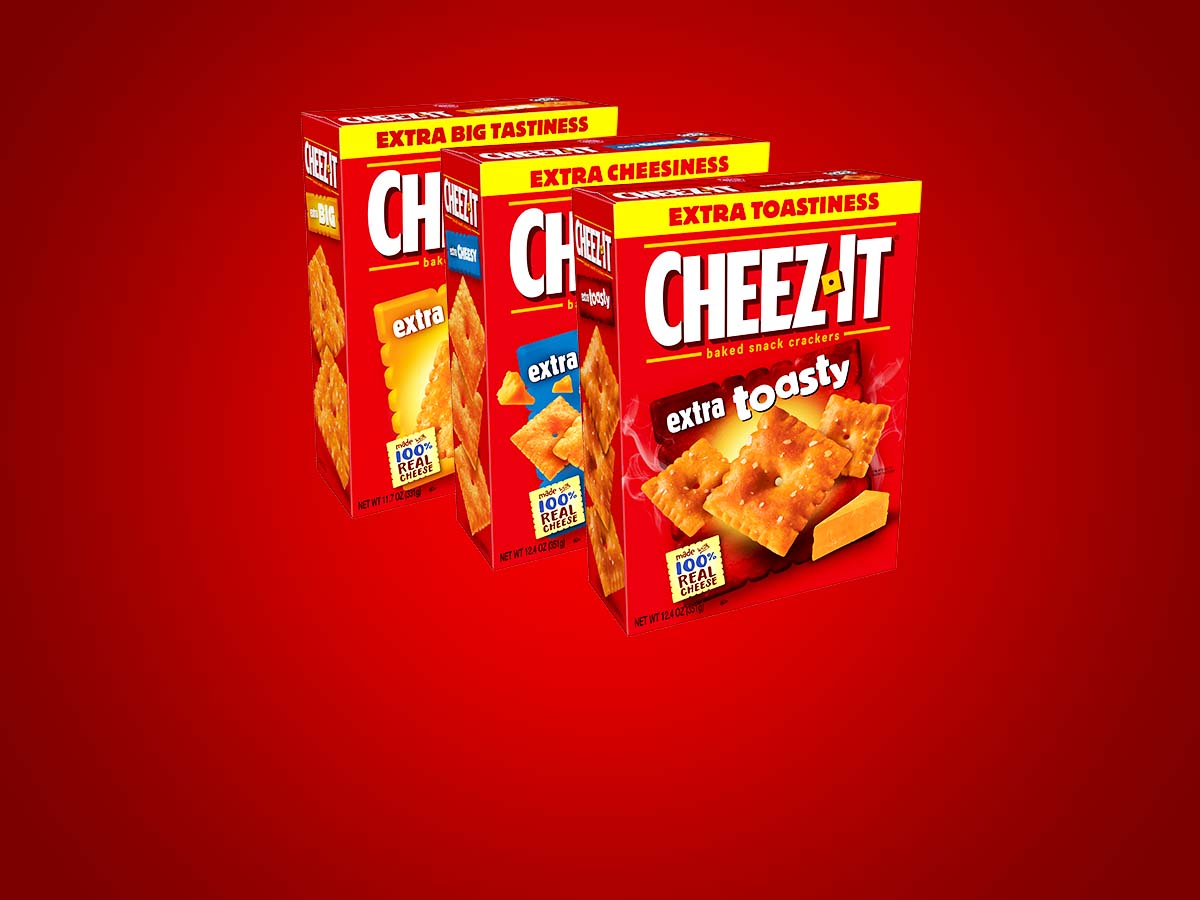 Three Cheez-It boxes on a red background